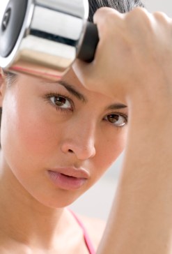 Woman Lifting Dumbbell